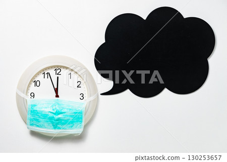 Face protection mask on clock show 12 hours, time lapse Face protection mask on clock show 12 hours, time lapse 130253657