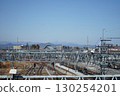 Railroad tracks, sky and mountains 130254201