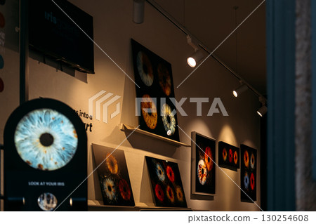 Art gallery offers personalized iris photography transforming human eyes into striking artworks. Contemporary art, biometric identity, personalization, creative commerce 130254608