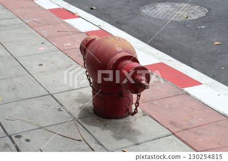Scenery of a fire hydrant on the road in Bangkok, Thailand Scenery of a fire hydrant on the road in Bangkok, Thailand 130254815