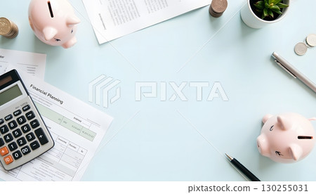 Financial Planning Desk with Piggy Banks, Calculator, Coins, and Documents Financial Planning Desk with Piggy Banks, Calculator, Coins, and Documents 130255031