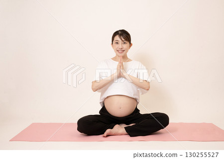 A woman doing maternity yoga 130255527