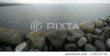 ancient dam of boulders 130255710