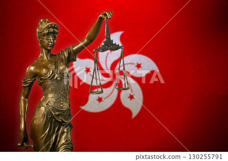 Lady Justice before a flag of Hong Kong 130255791