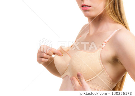 Girl wearing too big bra cup Girl wearing too big bra cup 130256178