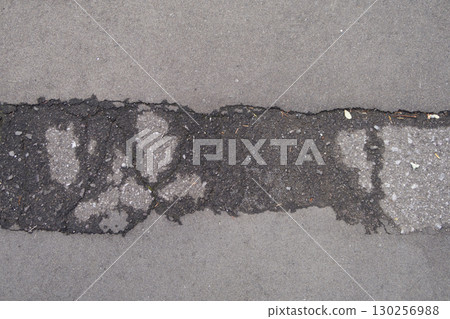 Weathered asphalt Weathered asphalt 130256988
