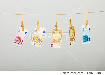 Banknotes on laundry line Banknotes on laundry line 130257080