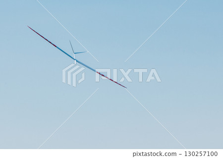 RC soaring plane on blue sky RC soaring plane on blue sky 130257100