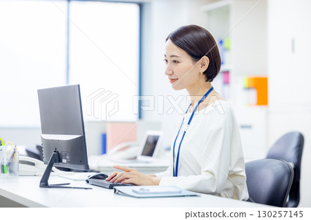 Business woman working in the office Business woman working in the office 130257145