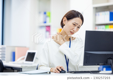 Stiff shoulders Business woman 130257203