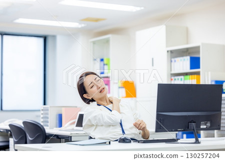 Stiff shoulders Business woman 130257204