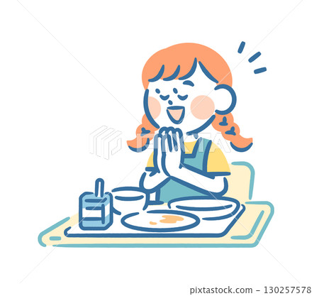 A girl finishes her school lunch and says "thank you for the meal" 130257578