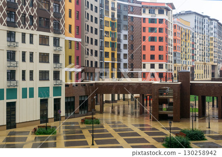 courtyard of an apartment building in the city center during the rain courtyard of an apartment building in the city center during the rain 130258942
