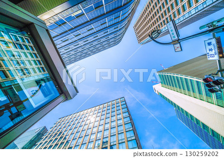 Tokyo cityscape, Japan, August 21. View of the redevelopment project and buildings in Nihonbashi 1-chome from the Nihonbashi intersection. Tokyo cityscape, Japan, August 21. View of the redevelopment project and buildings in Nihonbashi 1-chome from the Nihonbashi intersection. 130259202