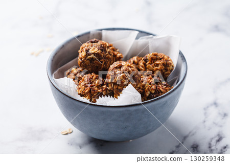 Oatmeal balls with peanut butter and chocolate chips. Oatmeal balls with peanut butter and chocolate chips. 130259348