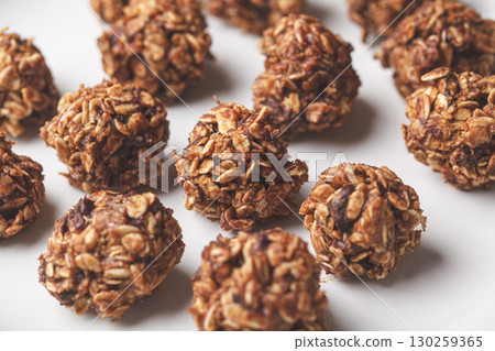 Oatmeal balls with peanut butter and chocolate chips. Oatmeal balls with peanut butter and chocolate chips. 130259365