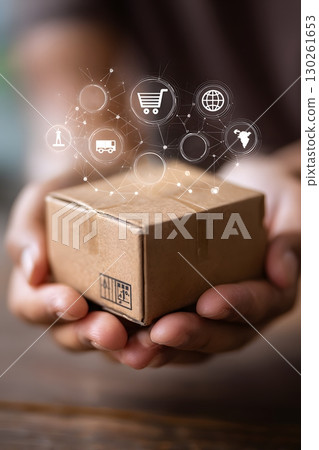 hands holding parcel with shipping icons overlay hands holding parcel with shipping icons overlay 130261653