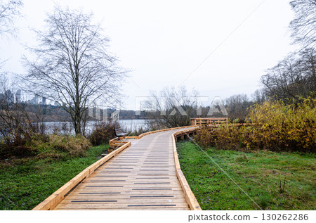 Elevated wooden walkay in Burnaby Deer Lake Park, BC, Canada Elevated wooden walkay in Burnaby Deer Lake Park, BC, Canada 130262286