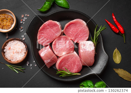Raw uncooked pork tenderloin medallions 130262374