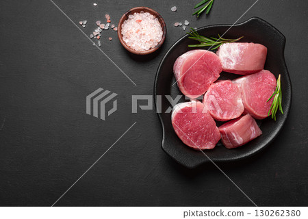 Raw uncooked pork tenderloin medallions 130262380
