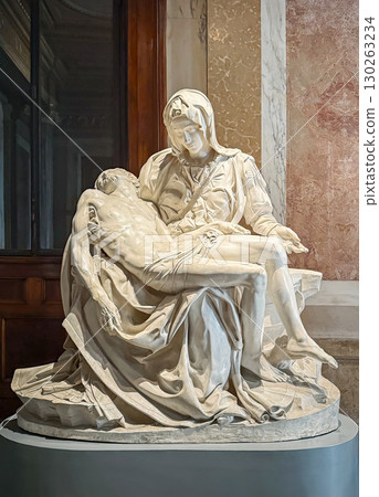 VATICAN CITY, ROME, ITALY - AUGUST 02, 2025 A close-up of Michelangelo's iconic marble sculpture masterpiece, the Pieta. It depicts the Virgin Mary cradling the body of Jesus Christ 130263234