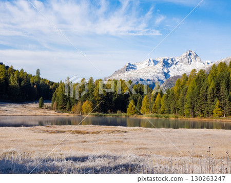 St. Moritz, Switzerland - October 6th 2024: Idyllic lake Lej da Staz in the morning sunlight 130263247