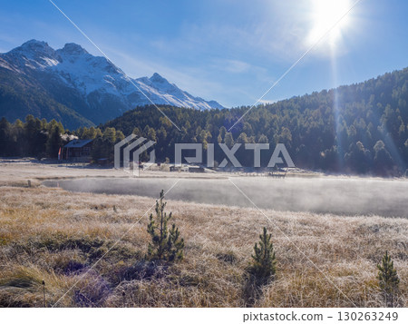 St. Moritz, Switzerland - October 6th 2024: Idyllic lake Lej da Staz in the morning sunlight 130263249