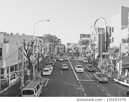 A street scene of Kyu-Yamate-dori Street, overflowing with luxury. An elegant street corner scene away from the hustle and bustle of the city. An illustration-style photo. 130263376