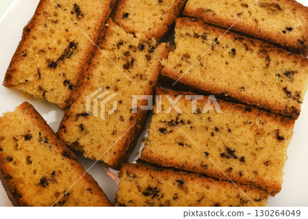 A delicious cupcake with a crumb of chocolate.  Bread with chocolate. A sweet cupcake. 130264049