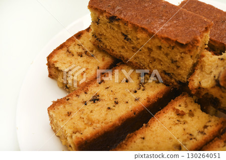 A delicious cupcake with a crumb of chocolate.  Bread with chocolate. A sweet cupcake. 130264051