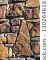 Weathered Dirty Wall made up from Gray Stone. old stone wall background. Unique pattern concrete exterior wall . High quality photo 130264618