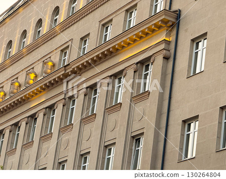 Side view of Hotel Balkan stone facade with decorative columns and illuminated architectural details. Heritage, hospitality, and timeless urban culture in central Belgrade. Side view of Hotel Balkan stone facade with decorative columns and illuminated architectural details. Heritage, hospitality, and timeless urban culture in central Belgrade. 130264804