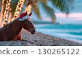 beautiful brown horse symbol of chinese new year 2026 on the background of sandy beach on vacation at sea with palm trees in santa claus hat 130265122