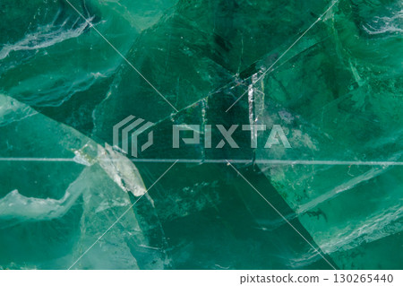 Macro mineral stone Fluorite crystal on a black background 130265440