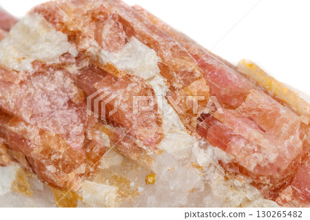 Macro mineral stone Tourmaline in the breed a white background Macro mineral stone Tourmaline in the breed a white background 130265482