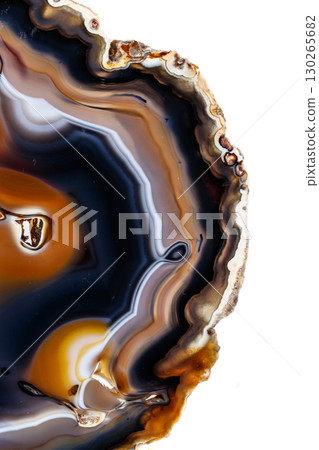 Macro mineral stone Yellow, brown Agate breed a white background Macro mineral stone Yellow, brown Agate breed a white background 130265682