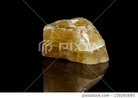 Macro mineral stone yellow Calcite on a black background Macro mineral stone yellow Calcite on a black background 130265693