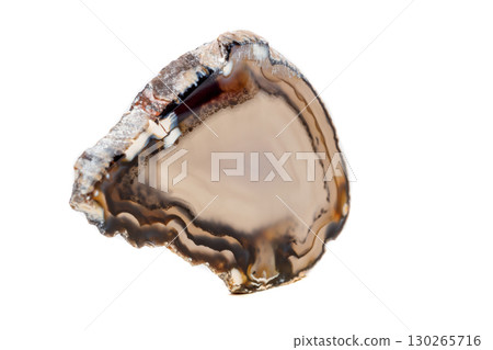 Macro mineral stone Yellow, brown Agate breed a white background 130265716