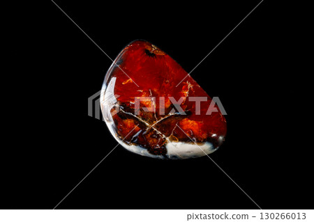 Macro mineral stone Cornelian on a black background 130266013