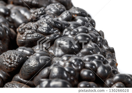 Macro mineral Hematite stone on a white background close-up Macro mineral Hematite stone on a white background close-up 130266028