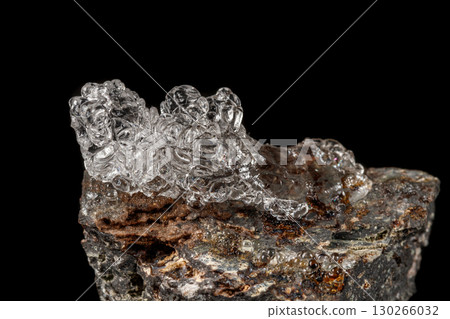 Macro Hyalite mineral stone on a black background 130266032