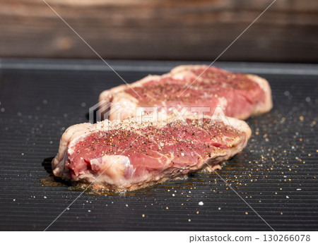 fresh raw beef steaks fresh raw beef steaks 130266078