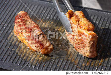 freshly grilled beef striploin steaks freshly grilled beef striploin steaks 130266087