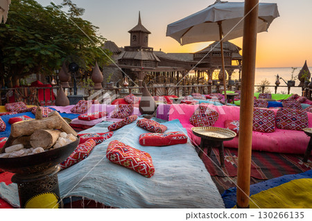 Vintage Arabic oriental cafe. Place to relax on beach Ras Umm El Sid of Red Sea. Sharm El Sheikh, Egypt. High quality photo Vintage Arabic oriental cafe. Place to relax on beach Ras Umm El Sid of Red Sea. Sharm El Sheikh, Egypt. High quality photo 130266135
