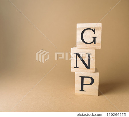 Stack of wooden blocks with the letters G, N, and P on top 130266255