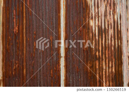 Close-up of an old rusty galvanized iron plate with peeling paint - metal background Close-up of an old rusty galvanized iron plate with peeling paint - metal background 130266519