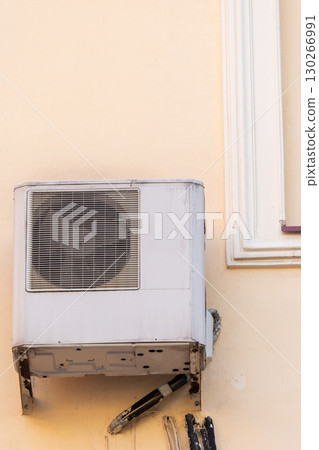 air conditioner is mounted on wall. technologies for air cooling in hot weather. air temperature 130266991