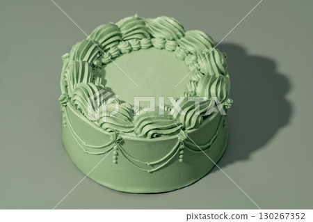 Pistachio, mango, and passion fruit cake with intricate frosting design, showcasing bakery artistry and inviting copy space for menu design Pistachio, mango, and passion fruit cake with intricate frosting design, showcasing bakery artistry and inviting copy space for menu design 130267352