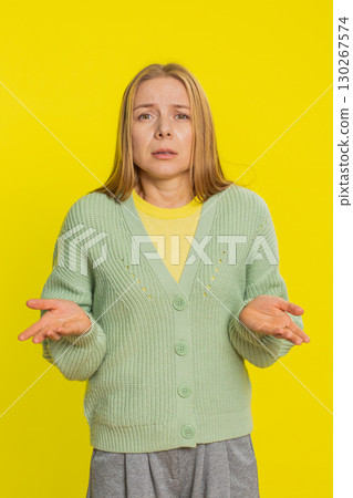 Sad young woman loses becoming surprised by lottery results bad fortune loss unlucky fortune news 130267574