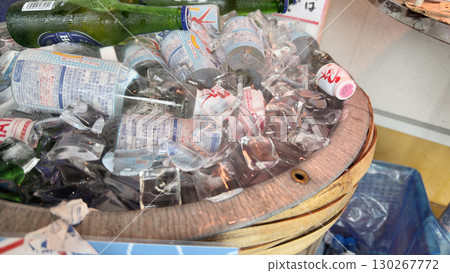 Ramune and beer chilled in an ice bucket 130267772